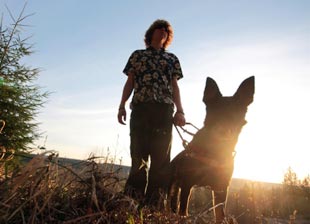 Photo of person with guide dog